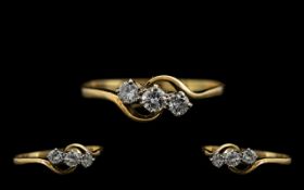 18ct Gold Attractive 3 Stone Diamond Ring the round brilliant cut diamonds of good colour.