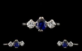 Platinum Set Nice Quality 3 Stone Diamond and Sapphire Ring of pleasing form, circa 1950's.