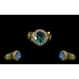 Peacock Quartz, Tanzanite and Enamel Ring, a 5.4ct faceted oval cut of the blue/ green two-tone,