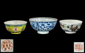 Transitional Ming Period Decorated Blue Bowl decorated with trailing flowers and vines to the body.
