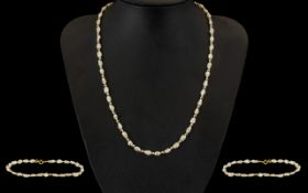 A Fine Quality 1980's Pearl Necklace Set with 14ct Gold Spacers and Clasp. Marked 14ct.