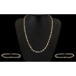 A Fine Quality 1980's Pearl Necklace Set with 14ct Gold Spacers and Clasp. Marked 14ct.