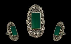 Art Deco Style Marcasite Silvered Metal Ring marked 925. Set with an oblong green coloured stone.