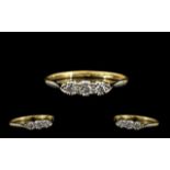 18ct Gold and Platinum Petite 3 Stone Diamond Ring - Illusion Setting. Marked 18ct & Platinum.