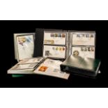 Stamp Interest - A Large Banana Style Box Containing Two A4 Stockbooks Full of GB First Day Covers,