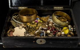 A Collection of Costume Jewellery to include brooches, bracelets and pendants.