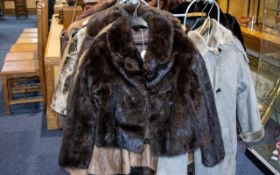 Ladies Short Mink Jacket dark brown colour, fully lined in brown sateen fabric.