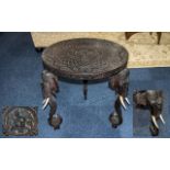 Indian Carved Round Teak Centre Table with carved top of typical form,