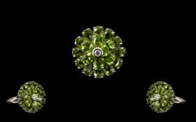 Peridot Circular Floral Style Ring, two circles of pear cut peridots,