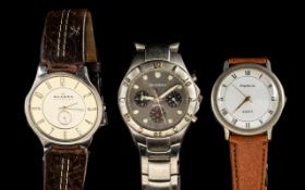 Three Gentleman's Watches comprising a Skagen of Denmark (a subsidiary of Fossil Watches) Watch