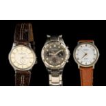 Three Gentleman's Watches comprising a Skagen of Denmark (a subsidiary of Fossil Watches) Watch