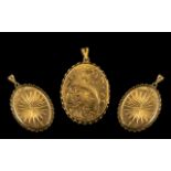 A 9ct Gold Ornate Oval Shaped Locket with Ornate Borders and Excellent Engraved Decoration to Front
