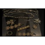 A Collection of Silvered Metal Brooches and Necklaces - circa 1920/30's.