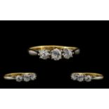 18ct Gold and Platinum 3 Stone Diamond Ring of Attractive Form. c.1920's / 1930's.