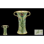 William Moorcroft Signed James Macintyre Twin Handle Celadon Vase, Decorated with Sprays of Roses,