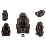 Japanese - Carved Boxwood Netsuke Depicts a Seated Monkey with Hands Covering Mouth, Ball Between