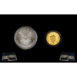 Elizabeth II Solid Gold Coin & R M S Pure Silver Titanic Coin.