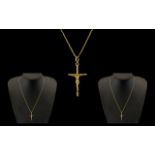 18ct Gold Cross with Attached 14ct Gold Long Chain - gold cross marked 18ct.