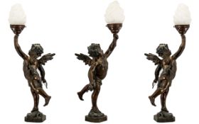 Antique Bronzed Spelter Winged Putti/Cupid Figure converted into a lamp and mounted on a marble