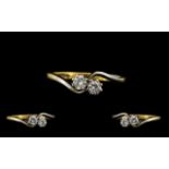 18ct Gold and Platinum Set Two Stone Diamond Ring of Attractive Form and Quality.