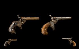 Two 19th Century Muff / Dog Pistols.