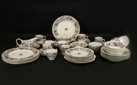 A Staffordshire Fine Bone China Part Tea Service 'Thousand Flowers' design. Approx 50 pieces.