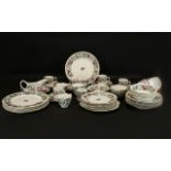 A Staffordshire Fine Bone China Part Tea Service 'Thousand Flowers' design. Approx 50 pieces.