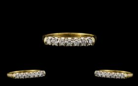 18ct Gold Nice Quality Seven Stone Diamond Ring - in a gallery setting.