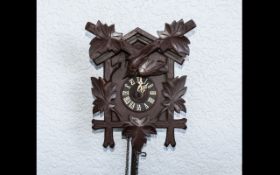 Wooden Cuckoo Clock in traditional form, in need of some assembly. Approx size of clock 9" x 7".