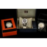 Three Quality Gentleman's Watches all in original boxes comprising a Badace silver toned bracelet