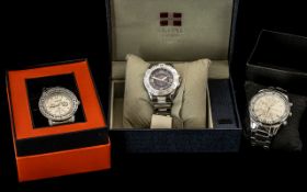 Three Quality Gentleman's Watches all in original boxes comprising a Badace silver toned bracelet