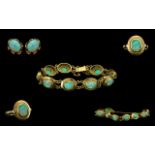 A Continental Suite Of 14ct Gold Opal Set Jewellery To Include A Bracelet Consisting Of Nine Oval
