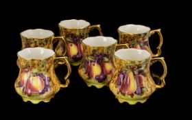 Six Handpainted Staffordshire Mugs in gold and yellow coloured design with fruit images,
