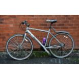 Gentleman's Discovery 301 Dawes Bike in silver grey with sprung saddle and water holder.
