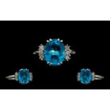 18ct White Gold - Superb Quality and Attractive Blue Topaz and Diamond Set Dress Ring.