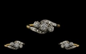 18ct Gold and Platinum 3 Stone Diamond Set Ring of Pleasing Form. From the 1950's.