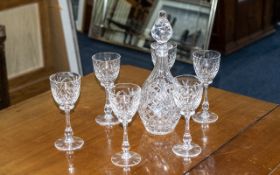 A Cut Glass Decanter and Six Wine Glasses.