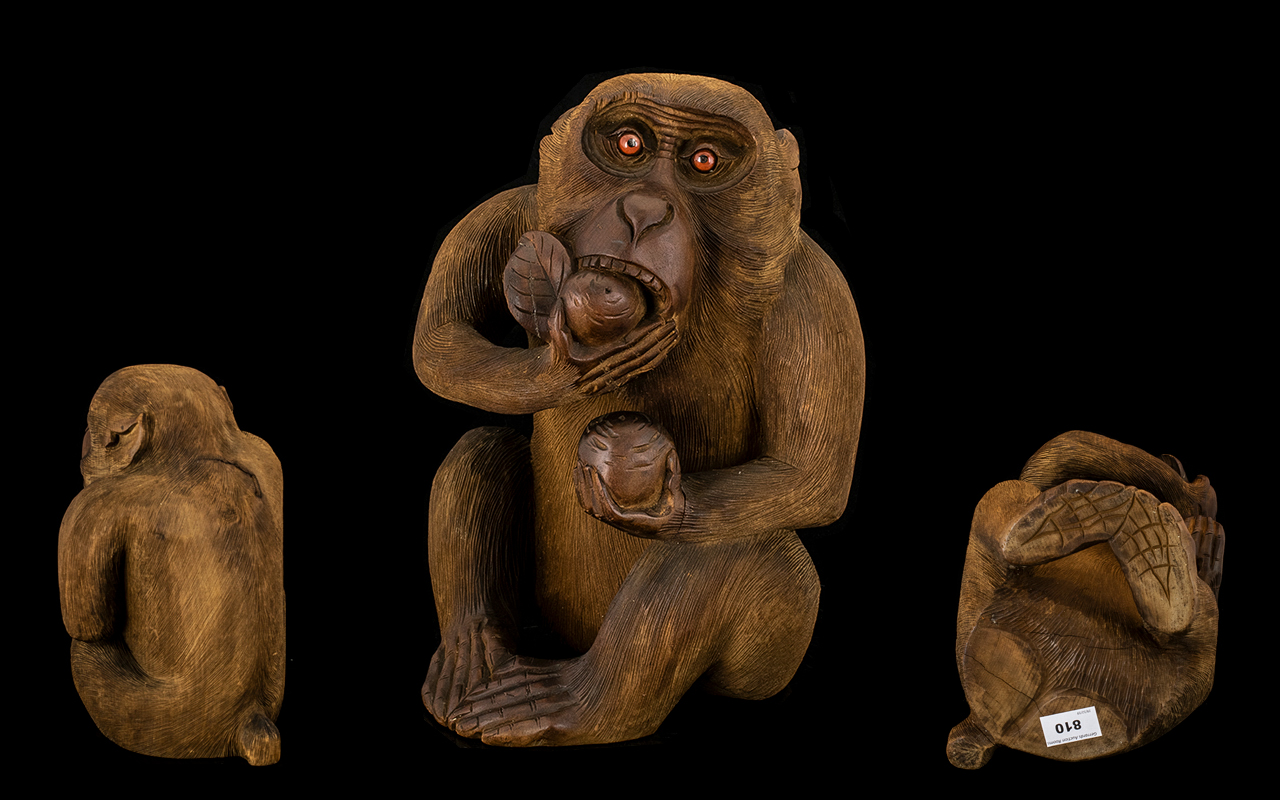 Japanese Large and Impressive Meiji Period Finely Carved Boxwood Seated Monkey Figure eating a