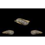 18ct Gold and Platinum Attractive Diamond Set Dress Ring of Petite Form.