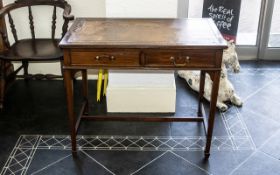 Edwardian Tooled Leather Top Mahogany Writing Desk with two front drawers with key,