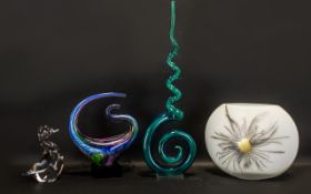 Two Coloured Glass Art Sculptures one in cobalt and blue shades raised on a black glass plinth