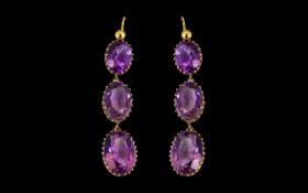 Victorian Period Stunning 15ct Gold Pair of Graduated Amethyst Set Drop Earrings - The six faceted