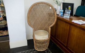 Cane Peacock Style Chair in natural colour with upholstered cream seat,