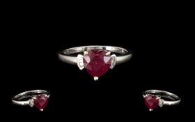 Ruby and Diamond Heart Shape Ring, a heart cut warm red ruby of 2.
