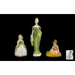 Three Royal Doulton Figures comprising: 'On The Beach' from the Child Study Series No.