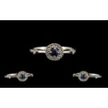 Ladies Petite 18ct White Gold Attractive Sapphire and Diamond Set Dress Ring, The Central Blue