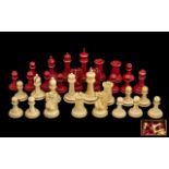 Carved And Turned Ivory Staunton Pattern Chess Set. One Side Natural Ivory The Other Stained Red.