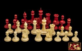 Carved And Turned Ivory Staunton Pattern Chess Set. One Side Natural Ivory The Other Stained Red.