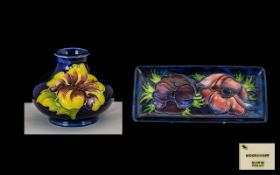 Moorcroft Hibiscus Decorated Miniature Squat Vase On A Blue Ground, Height 74mm,