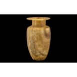 Antique Middle Eastern Calcite Jar with broad rimmed top, of typical shape.